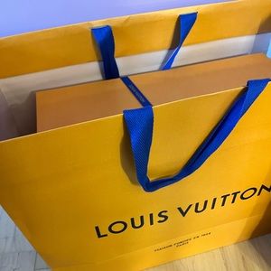 Louis Vuitton empty box, ribbon, blank gift card and bag.